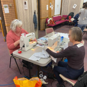 Volunteers-sewing-