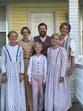 Chariton Family in 1840’s Pageant Costumes, taken in front of the Nauvoo, Illinois Temple USA 2022 Left to right Ember, Jenna, Gabe, Amy, and Cannon