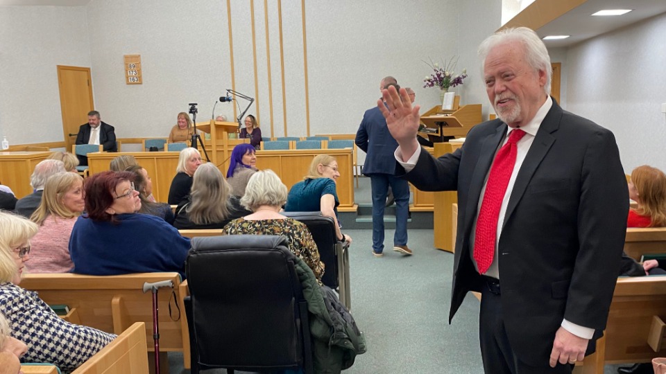 Merrill Osmond waves to guests at Solihull Chapel on 15 January 2023
